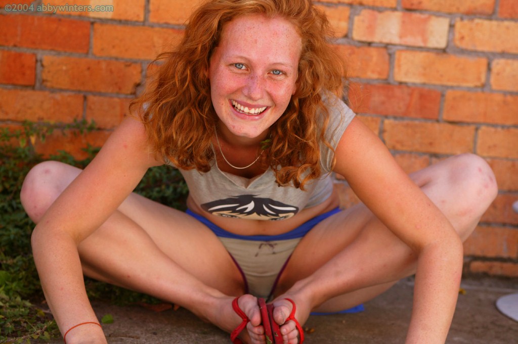 Freckled redhead hottie with big tits rubbing her pussy